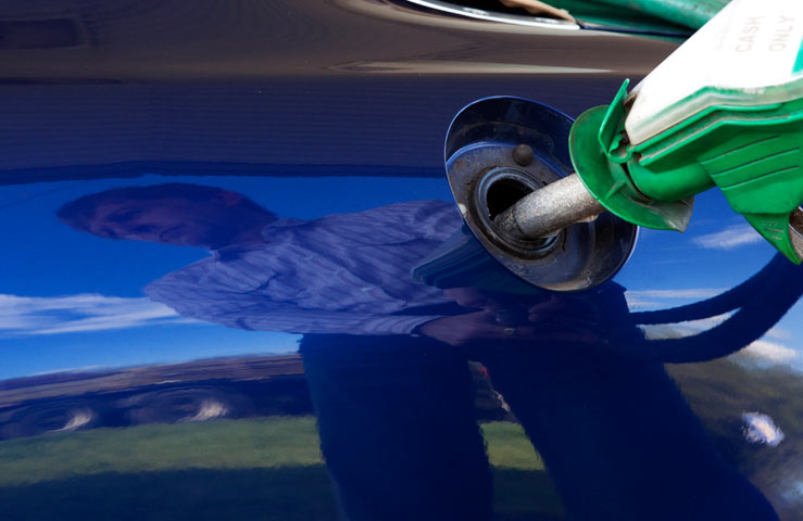 A motorist at a petrol pump