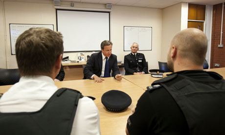 David Cameron talks to policemen