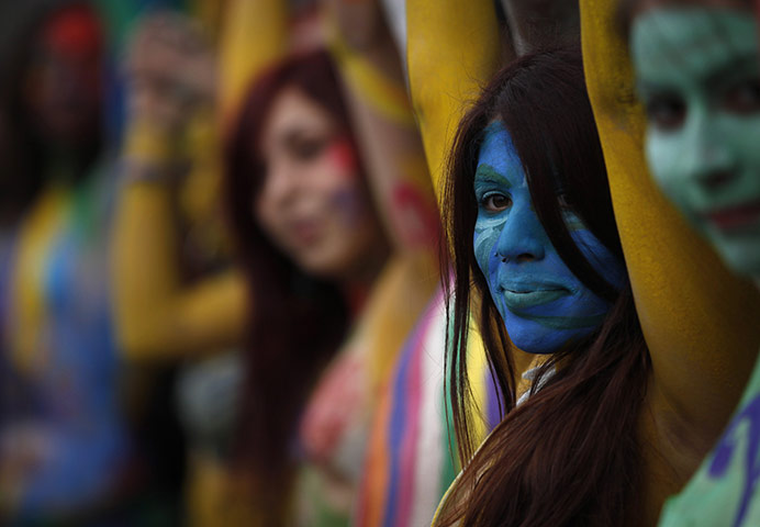 24 Hours: Students with their bodies painted protest in front of La Moneda palace