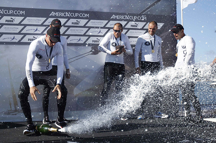 24 hours in pictures: Cascais, Portugal: Australian skipper drops a champagne bottle