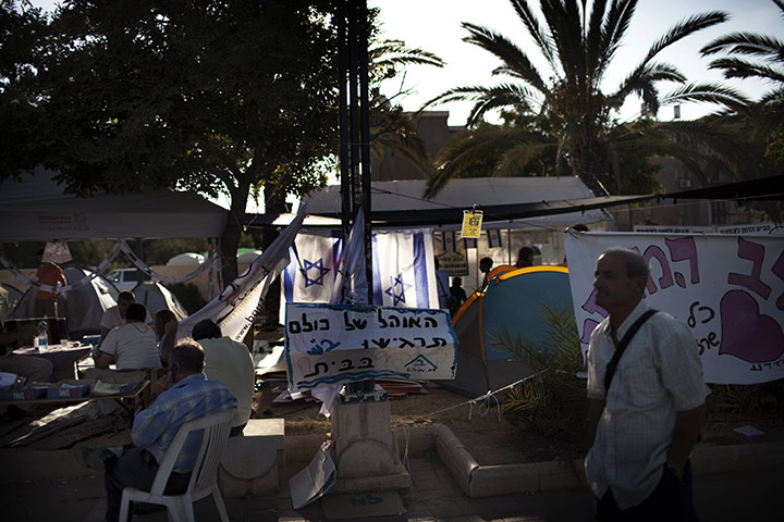 24 hours in pictures: Beersheva, Israel: Israeli protesters rest in their protest tent camp