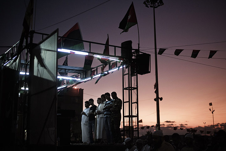 24 hours in pictures: Benghazi, Libya: Libyan men attend afternoon prayers before breaking fast