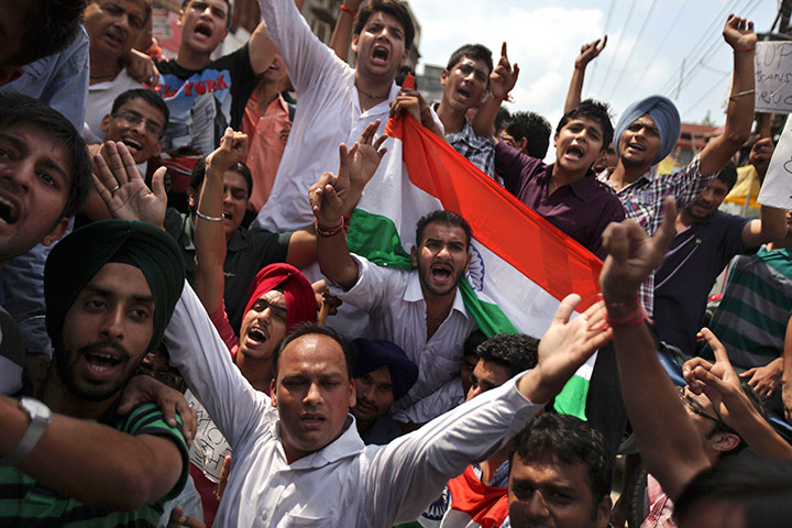 Anna Hazare : Supporters of Anna Hazare shout slogans during a protest in Amritsar