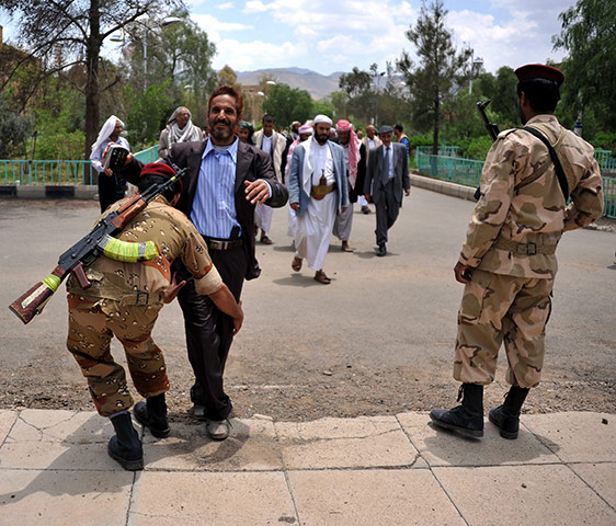 24 hours in pictures: Sana'a, Yemen: Soldiers search opposition leaders forming a council 