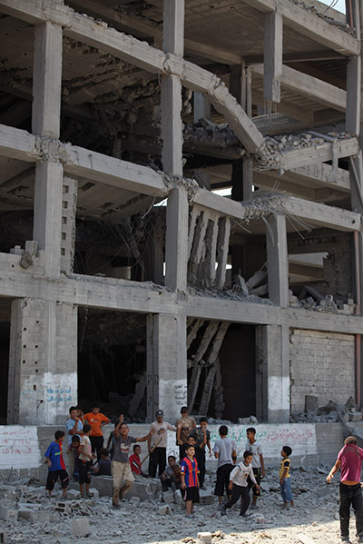 Israeli air strikes: Palestinians survey the bomb damage in Gaza City