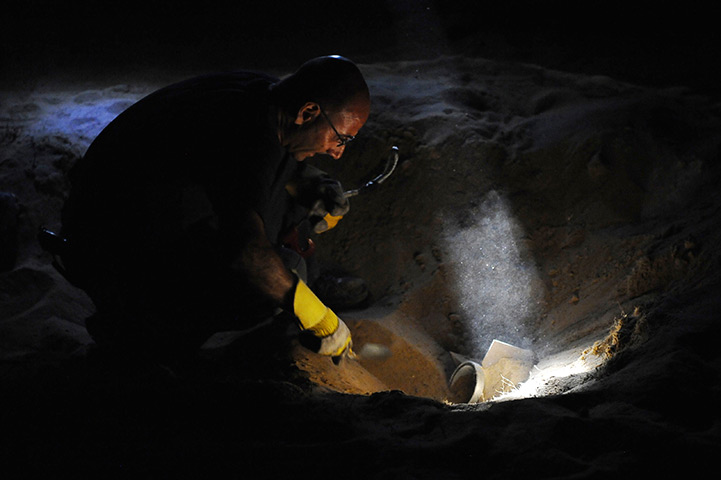 24 hours in pictures: emains of a rocket launched from the Gaza Strip  in Israel