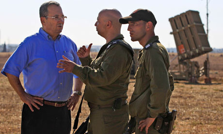 Ehud Barak, the Israeli defence minister, talks to soldiers in Ashkelon