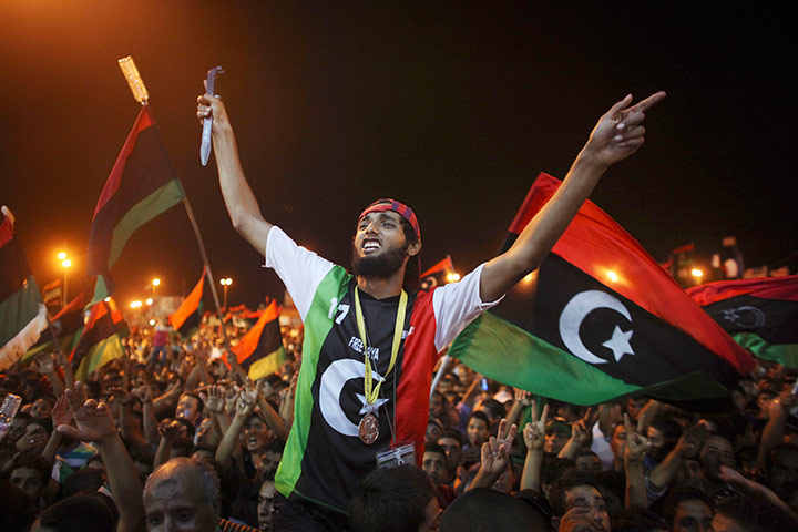 Muammar Gaddafi Libya : People celebrate at the rebel-held town of Benghazi