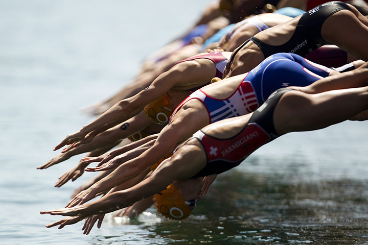 24 hours in pictures: Lausanne, Switzerland: Triathletes dive at the ITU World Championship