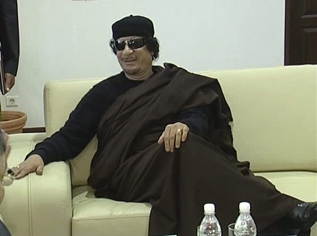 Gaddafi: 12 June 2011: A TV still of Muammar Gaddafi during a meeting