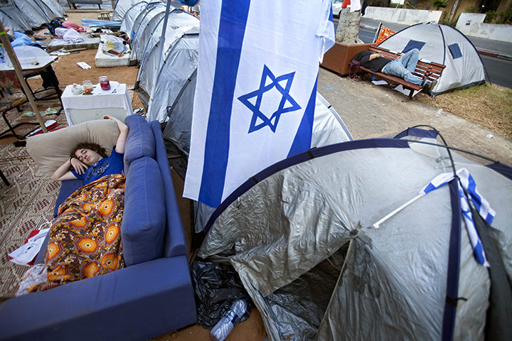 FTA: Oded Balilty: Israeli protesters sleep in a protest tent encampment