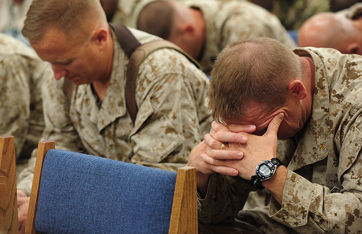 Afghanistan baptism: Members of the US and UK forces attend a Baptism service