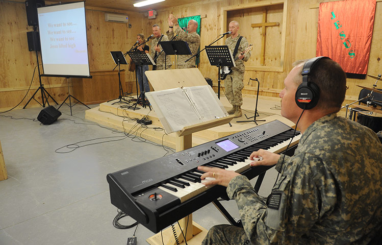 Afghanistan baptism: The service opens with music from the chapel band 'The Praise Team'