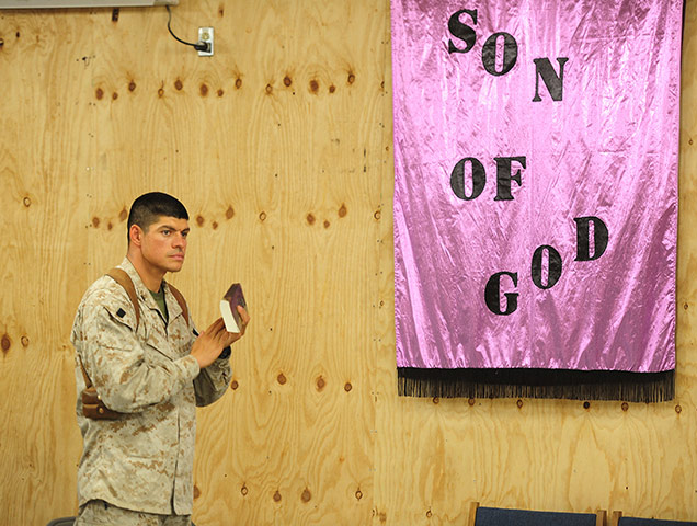 Afghanistan baptism: Members of the US and UK forces attend a Baptism service 