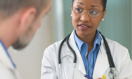 Female doctor listening to patient