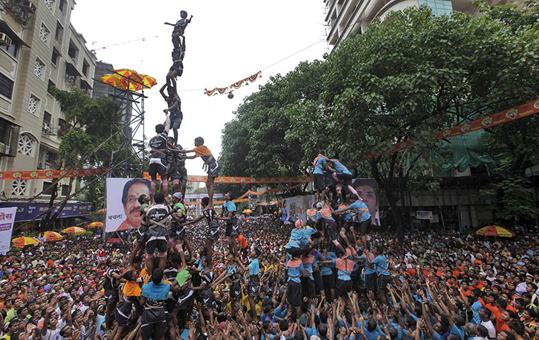 Krishna festival: Mumbai, India: Indian youth make a human pyramid