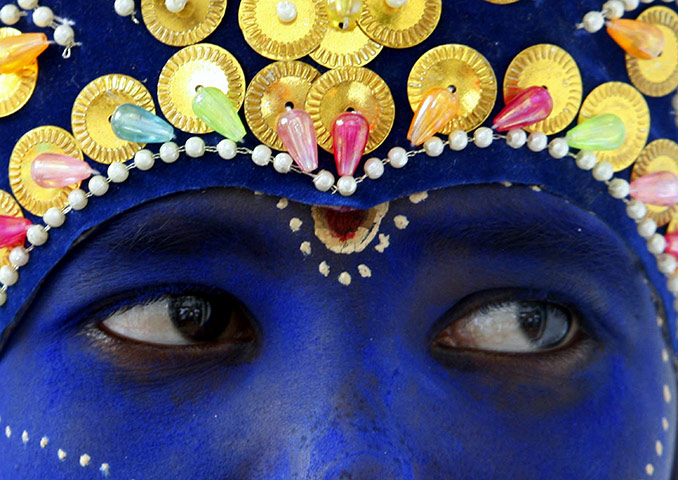 Krishna festival: Dhaka, Bangladesh: A child dressed as Hindu god Krishna