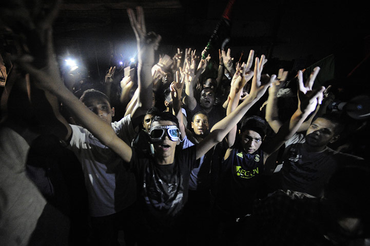 Battle for Tripoli: Supporters of Libya's rebels shout slogans in opposition to Muammar Gaddafi