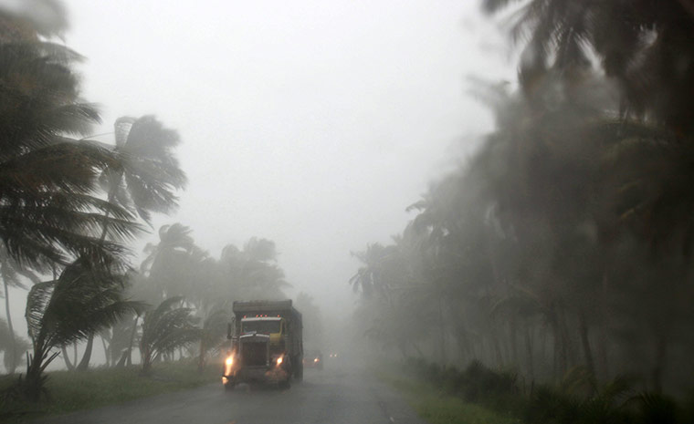 Hurricane Irene: A truck braves the storm as Hurricane Irene hits the Dominican Republic