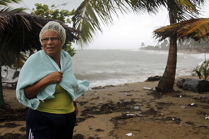 Hurricane Irene: A woman watches from a beach in Santo Domingo 