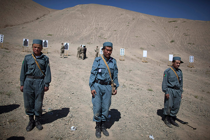 24 hours in pictures: Afghan policemen train at a live firing range, Bamiyan