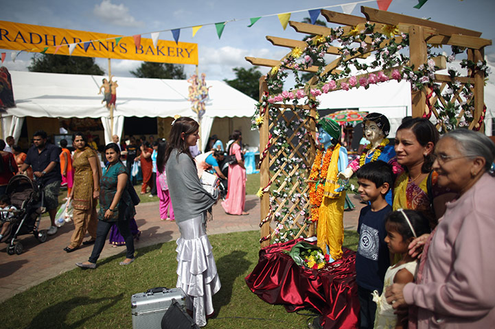 24 hours in pictures: Devotees arrive at Janmashtami Hindu Festival at Bhaktivedanta Manor, UK