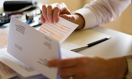 Close up of woman sorting paperwork