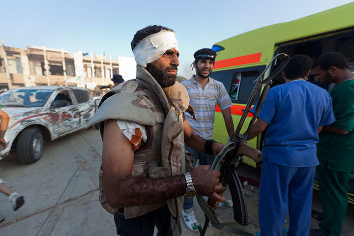 Sean Smith in Tripoli: An injured fighter is treated, Bab Al-Aziziya, Tripoli