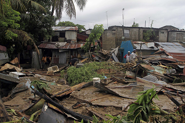 Hurricane Irene: Residents search for their belongings in their damaged houses