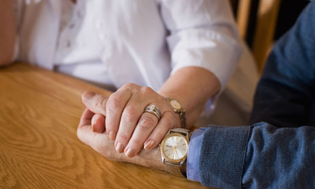 Couple holding hands