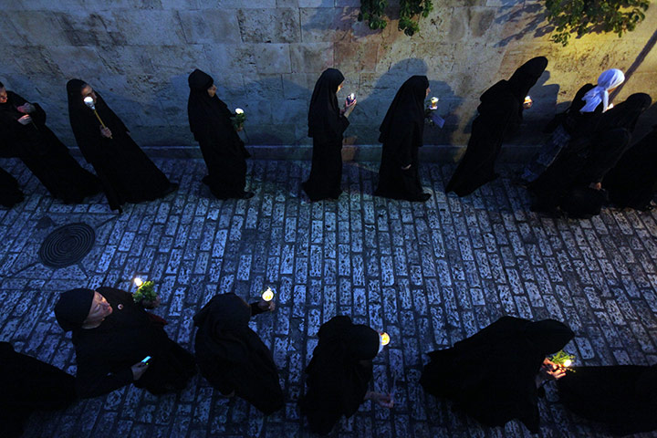 24 hours in pictures: Orthodox nuns take part in a procession, Jerusalem