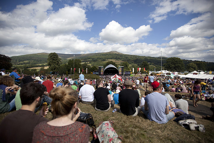 Green Man Festival: Revellers enjoy the warm weather as they watch the main stage