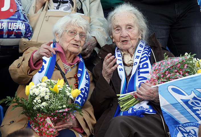 Champions League Draw: FC Zenit St. Petersburg fans Tsylya Savitskaya, left, & Regina Donde