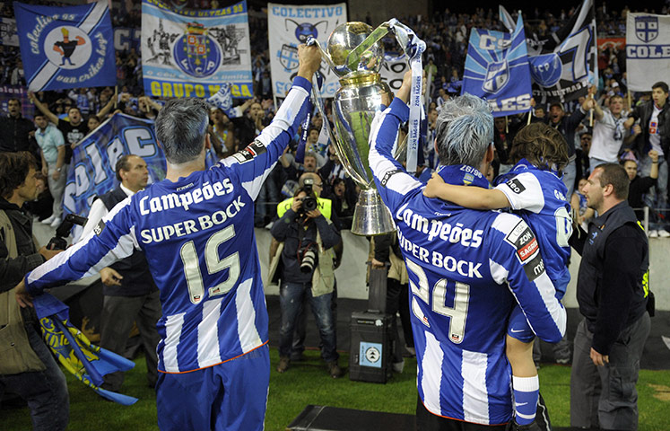 Champions League Draw: FC Porto's Rafael Silva & Antonio Pimparel hold the Super League cup 