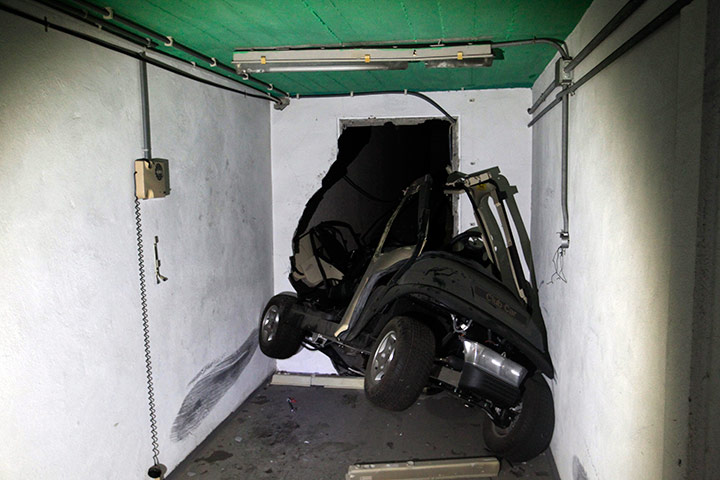 Bab al-Aziziya, Tripoli: A damaged electric golf cart in the bunker, Bab al-Aziziya compound