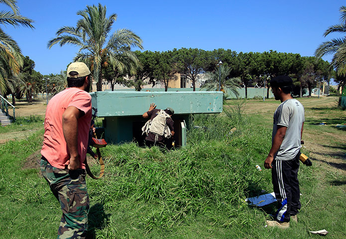 Bab al-Aziziya, Tripoli: Rebel fighters enter a bunker, Bab al-Aziziya compound