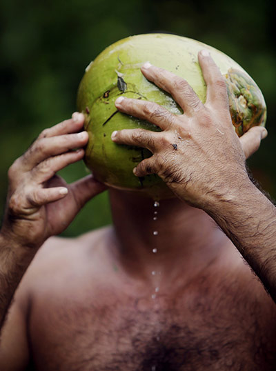 24 Hours: Yoandri Hernandez Garrido drinks juice from a coconut in Cuba
