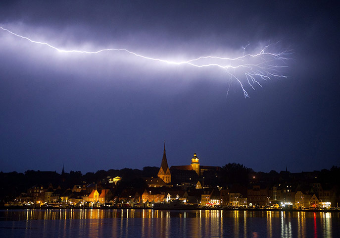 24 hours in pictures: Lightning illuminates the sky, Germany
