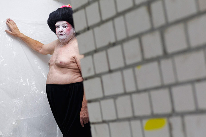 24 hours in pictures: A participant waits back stage at the 