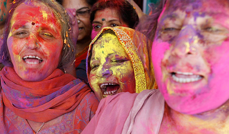 24 hours in pictures: Supporters of Anna Hazare with faces smeared in colour