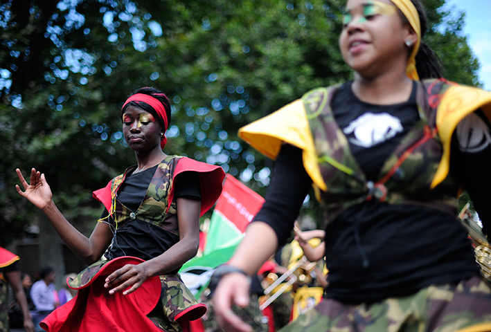 Notting Hill carnival: Performers take part in the Notting Hill Carnival children's day