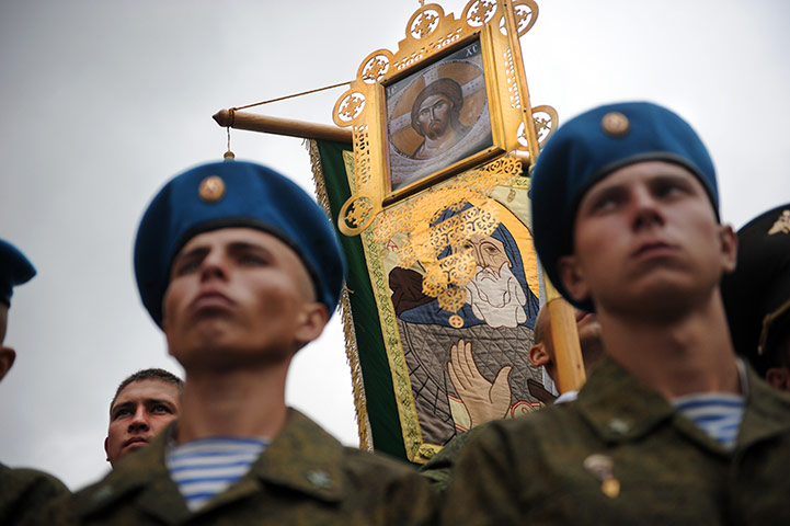 24 hours in pictures: Paratroopers stand during a Russian Orthodox service on Moscow's Red Square