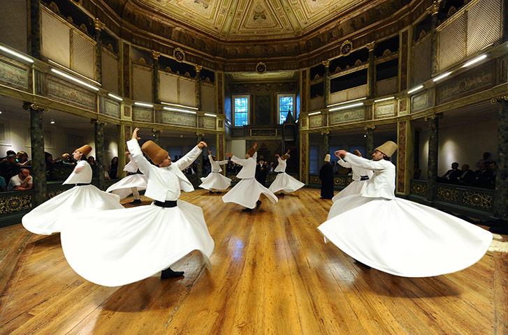 24 hours in pictures: Whirling dervishes perform at the Galata Whirling Dervish Hall, Turkey