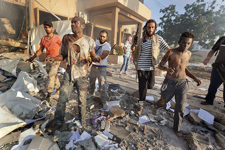 Sean Smith in Libya: 25 August: Rebels bring prisoners out of the remains of Abu Salim prison