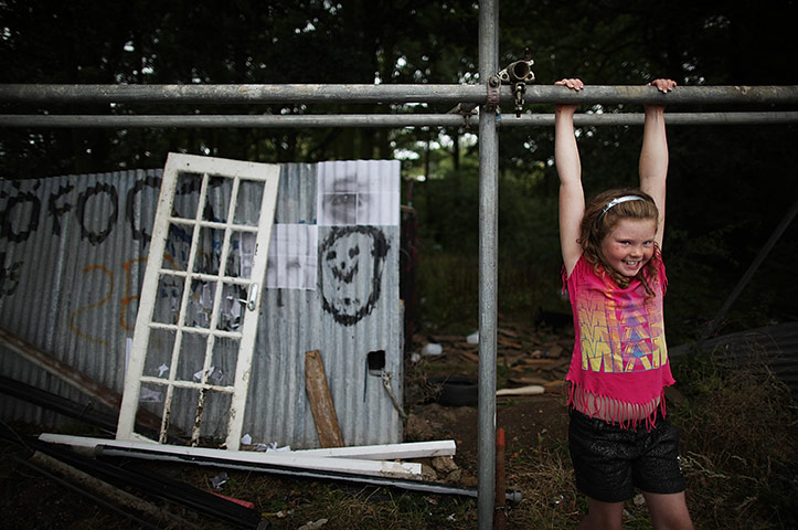 Dale Farm: 30 August 2011: A girl plays on a scaffolding barricade