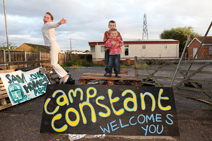 Dale Farm: 28 Aug 2011: Girls and boys from the site behind  the Camp Constant sign