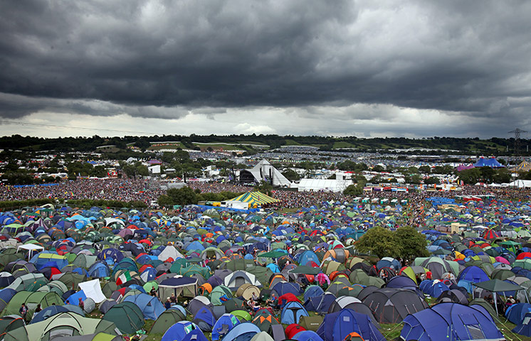Summer 2011: Glastonbury: Rain clouds gather over the Pyramid Stage