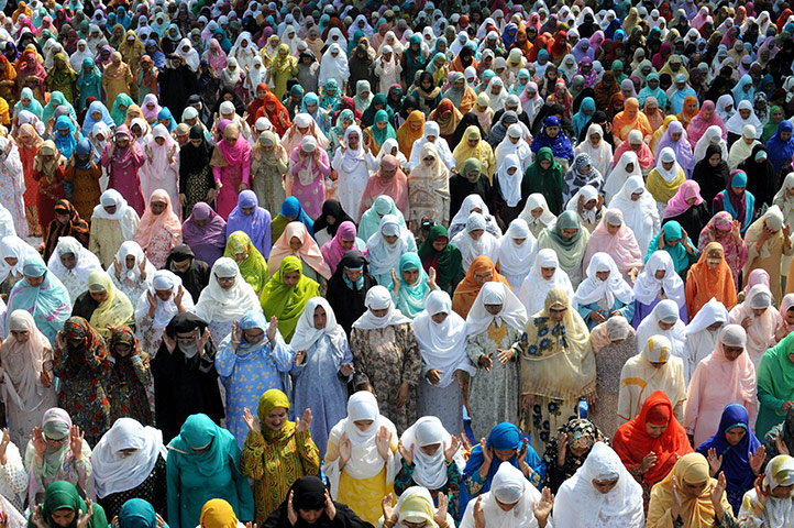 24 hours in pictures: Srinagar, India: Muslim women offer Eid al-Fitr prayers at Hazratbal shrine