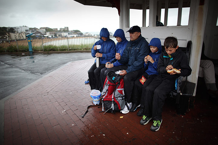 Summer 2011: Broadstairs: The Chambers family shelter from the wind