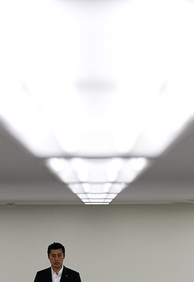 24 hours in pictures: Goshi Hosono 